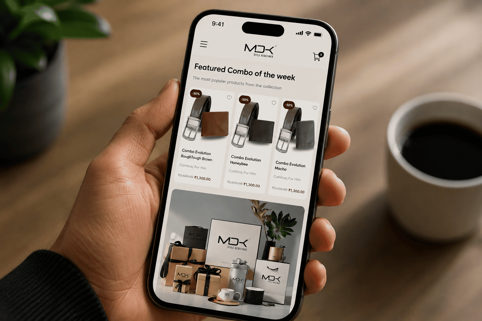 Hand holding phone with shopping app open.